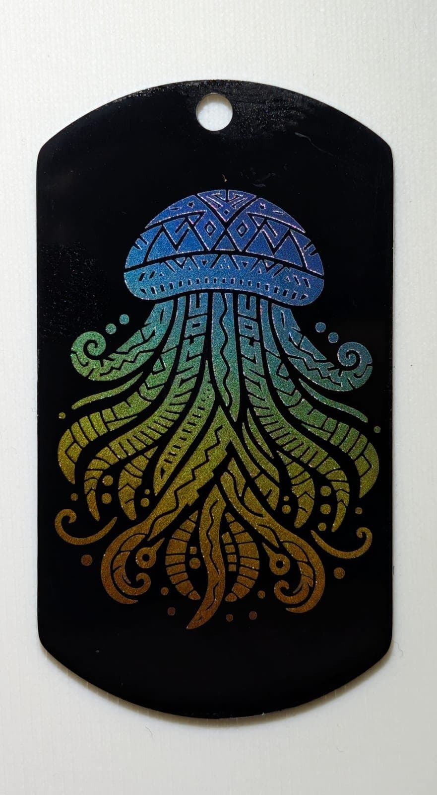 Zentangle jellyfish, iridescent mark on anodized tag